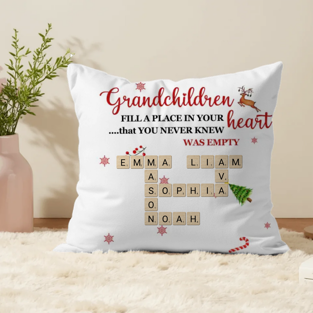 Custom Christmas grandma pillow featuring grandchildren’s names in a festive crossword layout with holiday icons